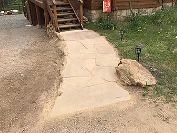 Red flagstone sideway in Allenspark, CO, by SR Custom Stone