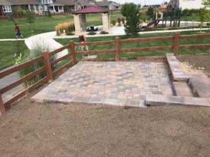 The lower landing, or patio, on this recently completed backyard living space featuring Borgert pavers and stairs.