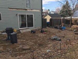 This underused Louisville, CO, backyard was made into a marvelous India blue stone patio.