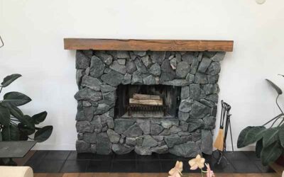 Granite Rip Rap Fireplace with Beetle-Kill Mantle in Longmont