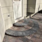 These circular steps are made with Bogert pavers and create a great accent for the back entryway.