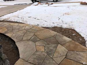 Colorado Buff sandstone is a likely alternative to the more commonly used red sandstone at this Boulder home.