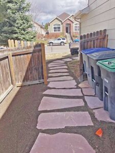 Red flagstone paves used for a Longmont sidewalk.