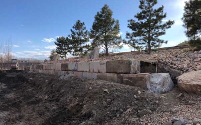 Large concrete blocks create a very stable retaining wall for rural property